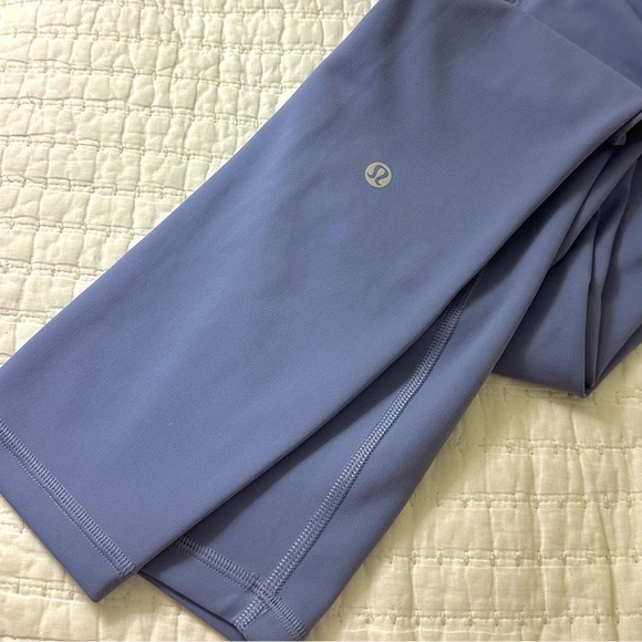 Lululemon Wunder Train High-Rise Tight with Pockets 25"
Water Drop Size 4 - Picture 5 of 5
